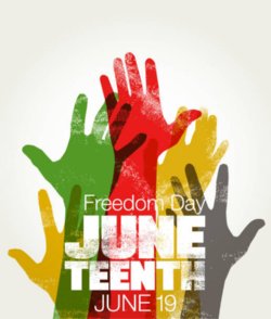 Colorful hands lifted over the sign of Juneteenth